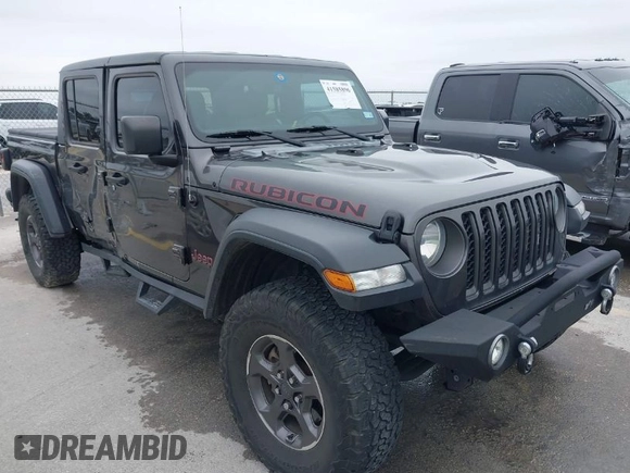 2020 Jeep Gladiator Rubicon with VIN 1C6JJTBG8LL135573, listed as a IAAI auction lot 41585896 with 79,070 mi miles and . Bid and sale history available at DreamBid. Image 1.
