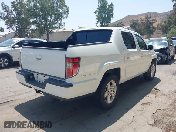 2012 Honda Ridgeline RTL z VIN 5FPYK1F57CB455267, wystawiony jako IAAI lot #42462296 z przebiegiem 186 451 mil mil oraz . Historia ofert i sprzedaży dostępna na DreamBid. Obrazek 4.