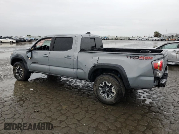 2021 Toyota Tacoma 4WD SR5 with VIN 3TMDZ5BN5MM098717, listed as a Copart auction lot 43877975 with 21,328 mi miles and Salvage Title. Bid and sale history available at carsss.com. Image 2.