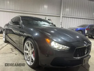 2014 Maserati Ghibli S Q4 z VIN ZAM57RTA9E1112724, wystawiony jako Copart lot #53585485 z przebiegiem 45 525 mil mil oraz Szkody całkowita. Historia ofert i sprzedaży dostępna na DreamBid. Obrazek 1.