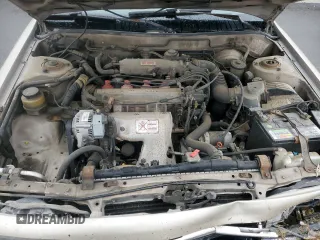 1991 Toyota Camry z VIN 4T1SV24E0MU379572, wystawiony jako Copart lot #78090294 z przebiegiem 242 052 mil mil oraz Szkoda całkowita • Salvage title. Historia ofert i sprzedaży dostępna na DreamBid. Obrazek 11.