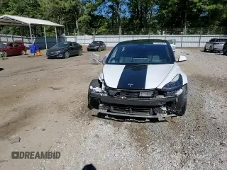 2021 Tesla Model 3 Standard Range Plus z VIN 5YJ3E1EA2MF098140, wystawiony jako Copart lot #73658044 z przebiegiem 118 452 mil mil oraz Szkoda całkowita • Salvage title. Historia ofert i sprzedaży dostępna na DreamBid. Obrazek 14.