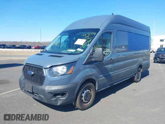 2021 Ford Transit Cargo with VIN 1FTBR3X84MKA54150, listed as a IAAI auction lot 41671756 with 96,556 mi miles and . Bid and sale history available at DreamBid. Image 17.