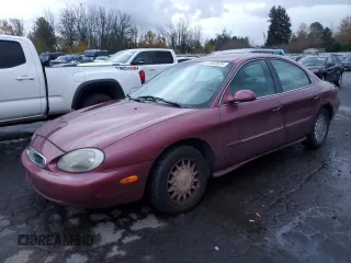 1996 Mercury Sable LS z VIN 1MELM53S9TG646191, wystawiony jako Copart lot #81002674 z przebiegiem 163 808 mil mil oraz Tytuł czysty. Historia ofert i sprzedaży dostępna na DreamBid. Obrazek 1.