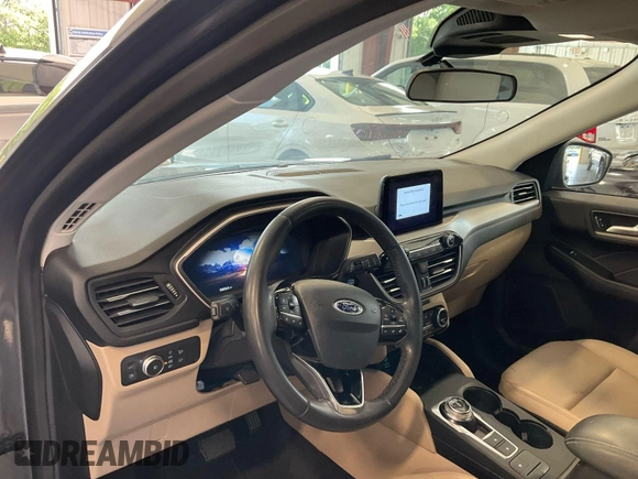 2021 Ford Escape SEL Hybrid z VIN 1FMCU9CZ7MUA83422, wystawiony jako IAAI lot #42743365 z przebiegiem 70 851 mil mil oraz . Historia ofert i sprzedaży dostępna na DreamBid. Obrazek 3.
