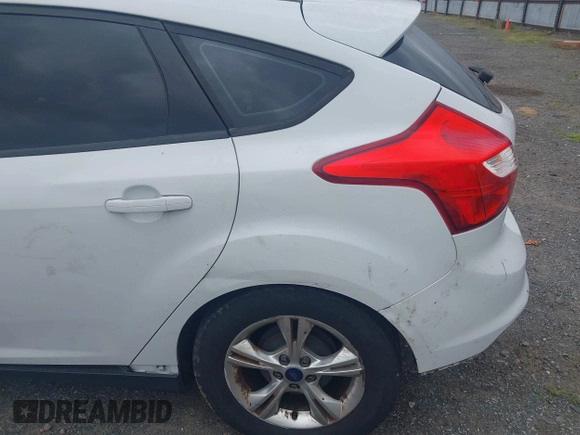 2014 Ford Focus SE z VIN 1FADP3K29EL233545, wystawiony jako IAAI lot #42282582 z przebiegiem 300 237 mil mil oraz . Historia ofert i sprzedaży dostępna na DreamBid. Obrazek 13.