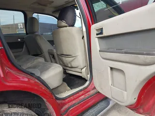 2011 Mercury Mariner z VIN 4M2CN8B76BKJ04064, wystawiony jako IAAI lot #41973530 z przebiegiem 137 753 mil mil oraz . Historia ofert i sprzedaży dostępna na DreamBid. Obrazek 8.