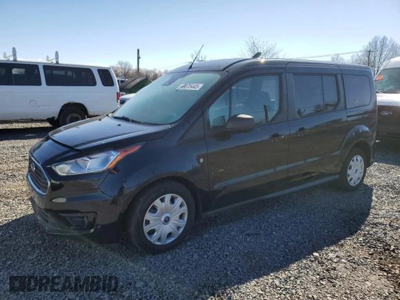 2019 Ford Transit Connect XLT z VIN NM0GE9F26K1402614, wystawiony jako Copart lot #49075445 z przebiegiem Nie podano mil oraz Szkoda całkowita • Salvage title. Historia ofert i sprzedaży dostępna na DreamBid. Obrazek 1.