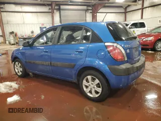 2009 Kia Rio LX with VIN KNADE243196505992, listed as a Copart auction lot 46054315 with 118,647 mi miles and Clean Title. Bid and sale history available at carsss.com. Image 2.