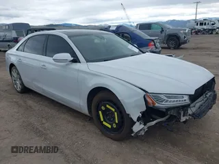 2015 Audi A8 3.0T with VIN WAU3GAFD7FN008940, listed as a IAAI auction lot 42014154 with 127,846 mi miles and . Bid and sale history available at DreamBid. Image 1.
