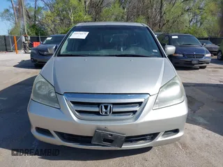 2006 Honda Odyssey EX-L z VIN 5FNRL38786B428264, wystawiony jako IAAI lot #41974479 z przebiegiem 187 595 mil mil oraz . Historia ofert i sprzedaży dostępna na DreamBid. Obrazek 6.