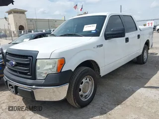2014 Ford F-150 XL with VIN 1FTEW1CMXEKD40762, listed as a IAAI auction lot 42400704 with 75,769 mi miles and . Bid and sale history available at DreamBid. Image 2.