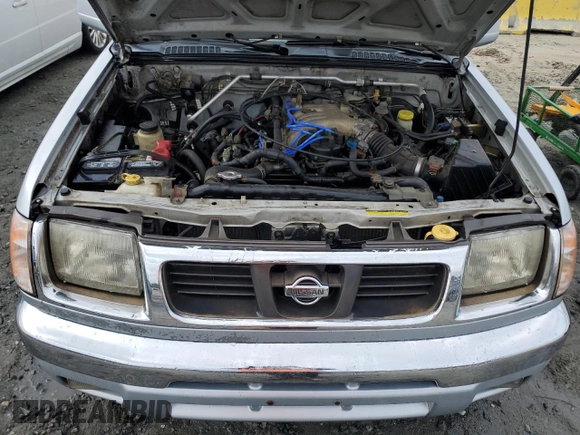 2000 Nissan Frontier XE with VIN 1N6ED26T0YC314102, listed as a Copart auction lot 83678264 with 174,419 mi miles and Salvage title. Bid and sale history available at DreamBid. Image 11.