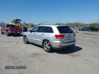 2011 Jeep Grand Cherokee Overland z VIN 1J4RR6GT6BC568491, wystawiony jako IAAI lot #42035464 z przebiegiem 147 389 mil mil oraz . Historia ofert i sprzedaży dostępna na DreamBid. Obrazek 3.