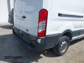 2023 Ford Transit Cargo with VIN 1FTBR1X84PKB02027, listed as a IAAI auction lot 42062820 with 79,813 mi miles and . Bid and sale history available at DreamBid. Image 6.