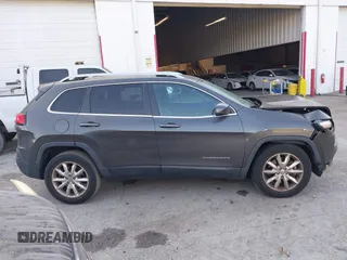 2014 Jeep Cherokee Limited z VIN 1C4PJLDS4EW238513, wystawiony jako IAAI lot #42093200 z przebiegiem 77 007 mil mil oraz . Historia ofert i sprzedaży dostępna na DreamBid. Obrazek 13.