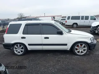 2000 Honda CR-V LX with VIN JHLRD2844YC010848, listed as a IAAI auction lot 41678830 with 173,137 mi miles. Bid and sale history available at carsss.com. Image 13.