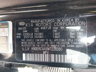 2021 Kia Seltos EX with VIN KNDERCAAXM7228380, listed as a IAAI auction lot 42015912 with 61,612 mi miles. Bid and sale history available at carsss.com. Image 9.