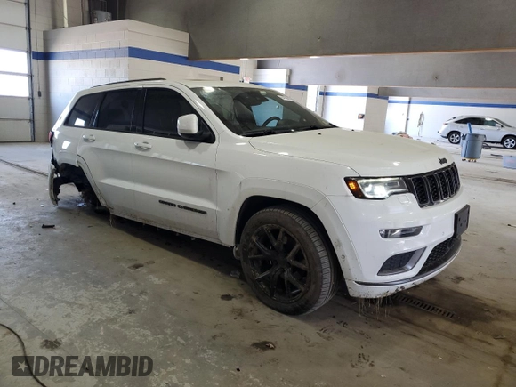 2018 Jeep Grand Cherokee Overland with VIN 1C4RJFCG5JC211145, listed as a Copart auction lot 54138865 with 115,679 mi miles and Salvage title. Bid and sale history available at DreamBid. Image 4.