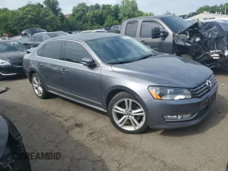2015 Volkswagen Passat SEL Premium with VIN 1VWCV7A34FC006176, listed as a Copart auction lot 60224195 with 107,983 mi miles and Salvage title. Bid and sale history available at DreamBid. Image 4.