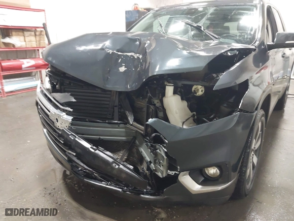 2019 Chevrolet Traverse LT Leather with VIN 1GNEVHKW7KJ235958, listed as a IAAI auction lot 41895988 with 79,097 mi miles. Bid and sale history available at carsss.com. Image 6.