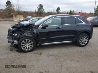 2020 Cadillac XT4 FWD Premium Luxury with VIN 1GYFZCR42LF049249, listed as a Copart auction lot 84954984 with 83,395 mi miles and Salvage Title. Bid and sale history available at carsss.com. Image 1.