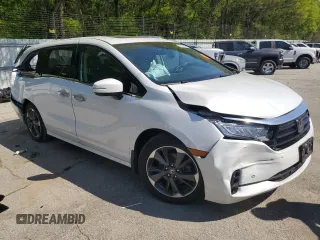 2022 Honda Odyssey Touring with VIN 5FNRL6H8XNB501482, listed as a Copart auction lot 52148875 with 32,568 mi miles and Salvage title. Bid and sale history available at DreamBid. Image 4.