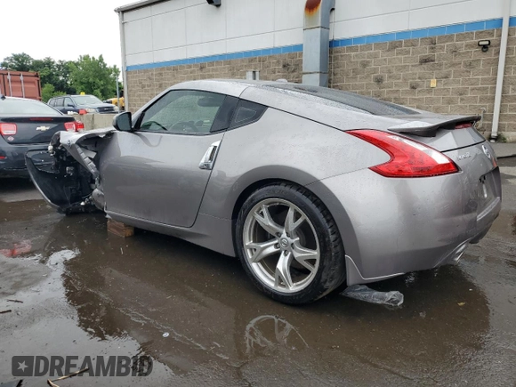 2009 Nissan 370Z Touring with VIN JN1AZ44E69M404789, listed as a Copart auction lot 62015094 with 56,447 mi miles and Salvage Title. Bid and sale history available at carsss.com. Image 2.