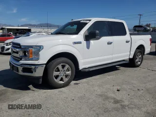 2019 Ford F-150 XL with VIN 1FTEW1C42KKE95060, listed as a Copart auction lot 47002095 with 153,184 mi miles and Salvage title. Bid and sale history available at DreamBid. Image 1.