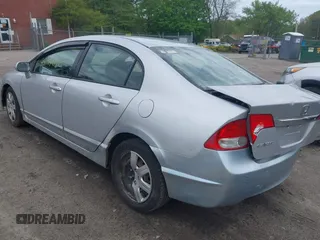 2010 Honda Civic LX with VIN 2HGFA1F59AH323381, listed as a IAAI auction lot 42181040 with 320,419 mi miles and . Bid and sale history available at DreamBid. Image 3.