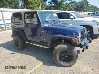 2002 Jeep Wrangler X with VIN 1J4FA39S32P735671, listed as a Copart auction lot 68236084 with 137,587 mi miles and Salvage Title. Bid and sale history available at carsss.com. Image 4.