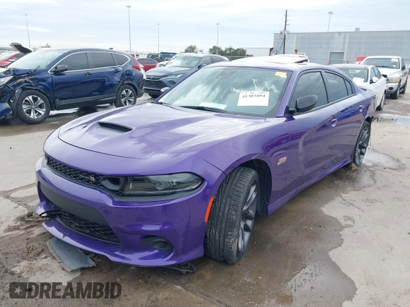 2023 Dodge Charger Scat Pack Widebody with VIN 2C3CDXGJ5PH699595, listed as a IAAI auction lot 41303894 with 1,828 mi miles and . Bid and sale history available at DreamBid. Image 18.