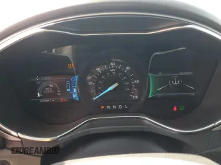 2013 Ford Fusion SE Hybrid z VIN 3FA6P0LU3DR336838, wystawiony jako Copart lot #56205445 z przebiegiem 209 164 mil mil oraz Czysty tytuł • Clean title. Historia ofert i sprzedaży dostępna na DreamBid. Obrazek 9.