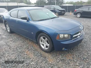 2009 Dodge Charger SXT with VIN 2B3KA33V39H585083, listed as a IAAI auction lot 41911176 with 134,600 mi miles and . Bid and sale history available at carsss.com. Image 1.
