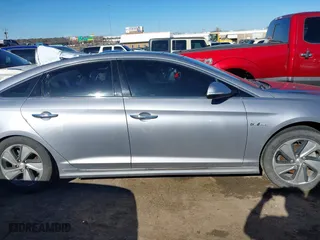 2016 Hyundai Sonata Hybrid Limited with VIN KMHE34L1XGA022774, listed as a IAAI auction lot 41333870 with 145,755 mi miles. Bid and sale history available at carsss.com. Image 14.