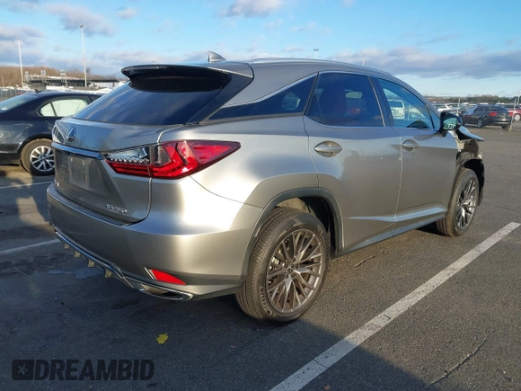 2021 Lexus RX with VIN 2T2SZMDA6MC307463, listed as a IAAI auction lot 40955402 with 7,308 mi miles. Bid and sale history available at carsss.com. Image 4.