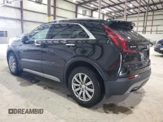 2020 Cadillac XT4 FWD Premium Luxury z VIN 1GYFZCR41LF143039, wystawiony jako Copart lot #57164005 z przebiegiem 24 218 mil mil oraz Nie do naprawy • Non repairable. Historia ofert i sprzedaży dostępna na DreamBid. Obrazek 2.