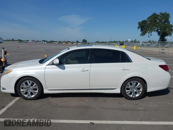 2011 Toyota Avalon with VIN 4T1BK3DB0BU414192, listed as a IAAI auction lot 42099301 with 220,967 mi miles and . Bid and sale history available at carsss.com. Image 14.