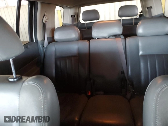 2004 Dodge Durango Limited with VIN 1D4HB58D94F241448, listed as a Copart auction lot 52537885 with 194,701 mi miles and Salvage Title. Bid and sale history available at DreamBid. Image 10.