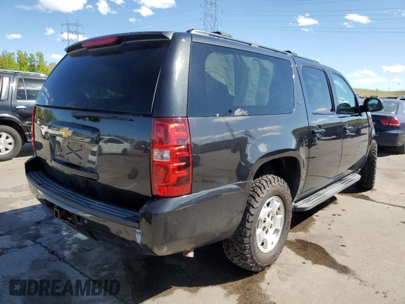 2013 Chevrolet Suburban LT with VIN 1GNSKJE70DR138631, listed as a Copart auction lot 57778185 with 176,934 mi miles and Salvage title. Bid and sale history available at DreamBid. Image 3.