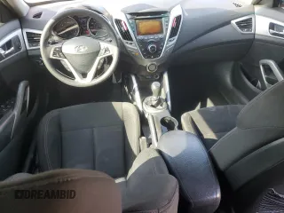 2013 Hyundai Veloster w/Gray Int z VIN KMHTC6AD1DU103219, wystawiony jako Copart lot #60426875 z przebiegiem 135 869 mil mil oraz Szkoda całkowita • Salvage title. Historia ofert i sprzedaży dostępna na DreamBid. Obrazek 8.