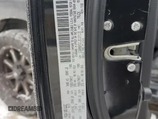 2018 Ram 1500 Express with VIN 1C6RR6FG1JS127115, listed as a Copart auction lot 43017055 with 87,487 mi miles and Salvage title. Bid and sale history available at DreamBid. Image 12.
