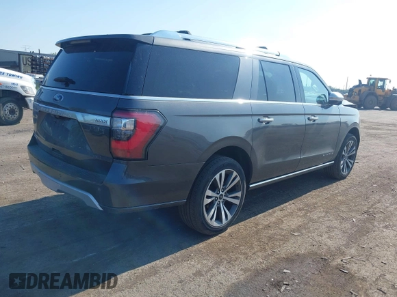 2021 Ford Expedition Max Platinum with VIN 1FMJK1MT8MEA66311, listed as a IAAI auction lot 42450429 with 95,732 mi miles and . Bid and sale history available at DreamBid. Image 4.
