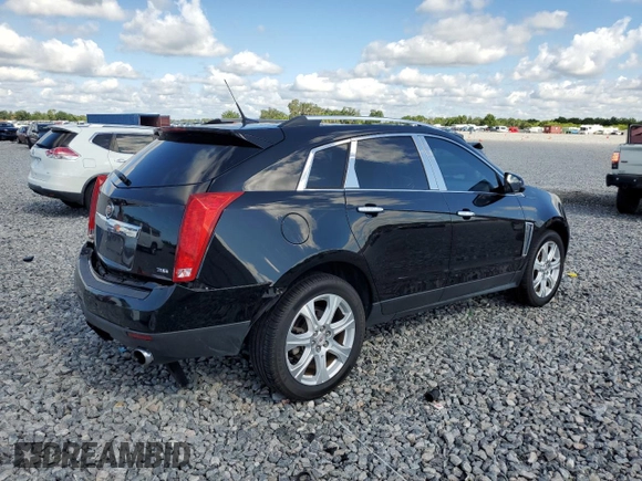 2013 Cadillac SRX Performance Collection with VIN 3GYFNHE37DS649235, listed as a Copart auction lot 56939285 with 104,692 mi miles and Salvage title. Bid and sale history available at DreamBid. Image 3.