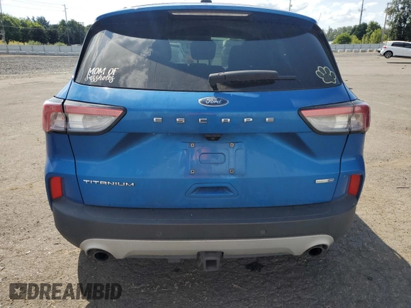 2020 Ford Escape Titanium z VIN 1FMCU9J90LUB15564, wystawiony jako Copart lot #59673625 z przebiegiem 84 474 mil mil oraz Czysty tytuł • Clean title. Historia ofert i sprzedaży dostępna na DreamBid. Obrazek 6.