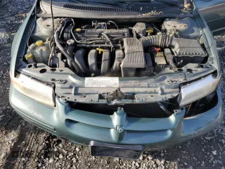 1996 Dodge Stratus z VIN 1B3EJ46XXTN285619, wystawiony jako Copart lot #78267884 z przebiegiem Nie podano mil oraz Szkoda całkowita • Salvage title. Historia ofert i sprzedaży dostępna na DreamBid. Obrazek 11.