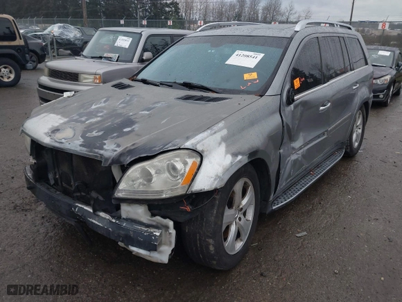 2010 Mercedes-Benz GL-Class GL 450 with VIN 4JGBF7BE5AA587487, listed as a IAAI auction lot 41208541 with 1 mi miles. Bid and sale history available at carsss.com. Image 6.