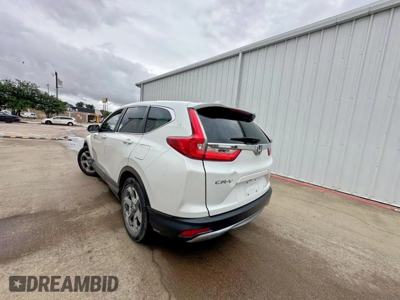 2019 Honda CR-V EX z VIN 7FARW1H50KE036985, wystawiony jako Copart lot #61110265 z przebiegiem 193 050 mil mil oraz Czysty tytuł • Clean title. Historia ofert i sprzedaży dostępna na DreamBid. Obrazek 3.