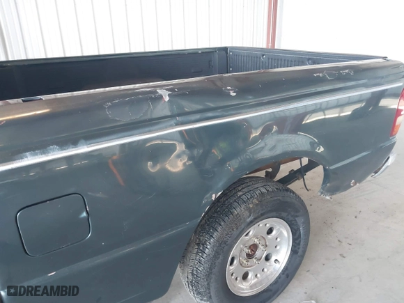 1997 Ford Ranger XL with VIN 1FTCR14AXVPB08765, listed as a IAAI auction lot 41840837 with 140,962 mi miles. Bid and sale history available at carsss.com. Image 6.