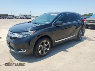 2019 Honda CR-V Touring с VIN 5J6RW2H96KL006580, выставлен на аукционе Copart как лот 58903865 с пробегом 96 154 миль миль и Списание • Salvage title. История ставок и продаж доступна на DreamBid. Изображение 1.